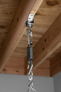 variant:lifestyle::TITLE Boxing Wooden Beam Heavy Bag T-Swivel shown on a wood beam