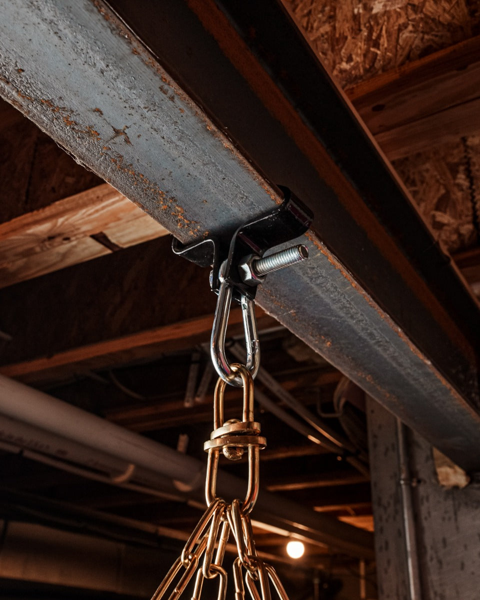 variant:lifestyle::TITLE Boxing I-Beam Heavy Bag Hanger shown on an i-beam