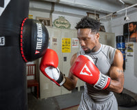 variant:Lifestyle::TITLE Boxing Heavy Bag Strike Foe boxing stance