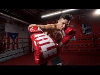 variant:Red/White::TITLE Boxing Inferno Intensity Elastic Training Gloves man throwing punch
