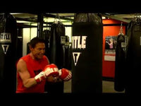variant:lifestyle::TITLE Boxing Gel Intense Heavy Bag Striking Sleeve man punching bag