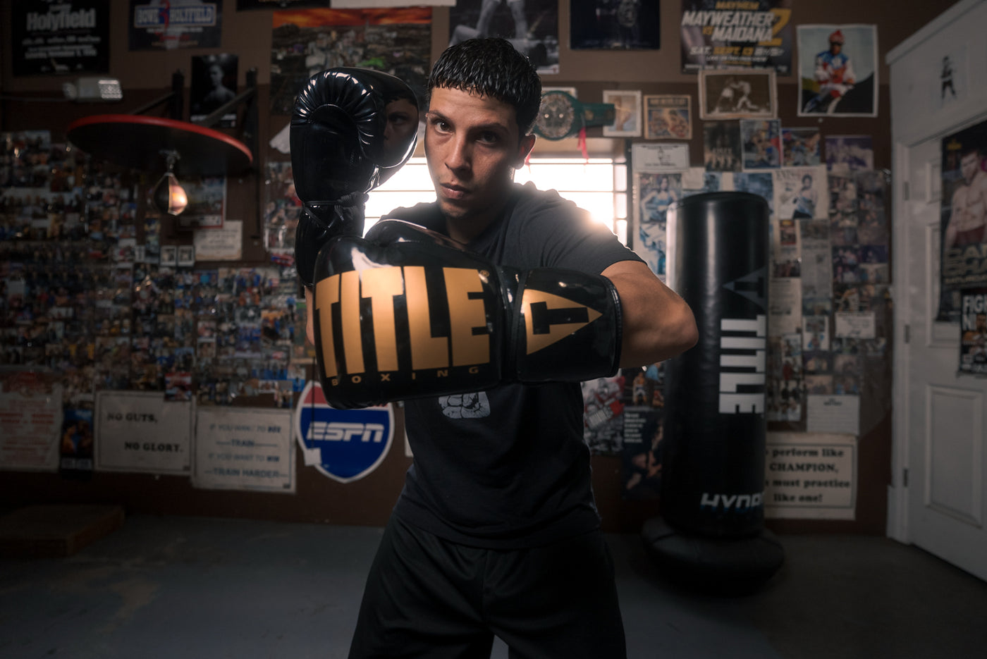 variant:Black/Gold::TITLE Boxing Inferno Intensity Lace Training Gloves left hook
