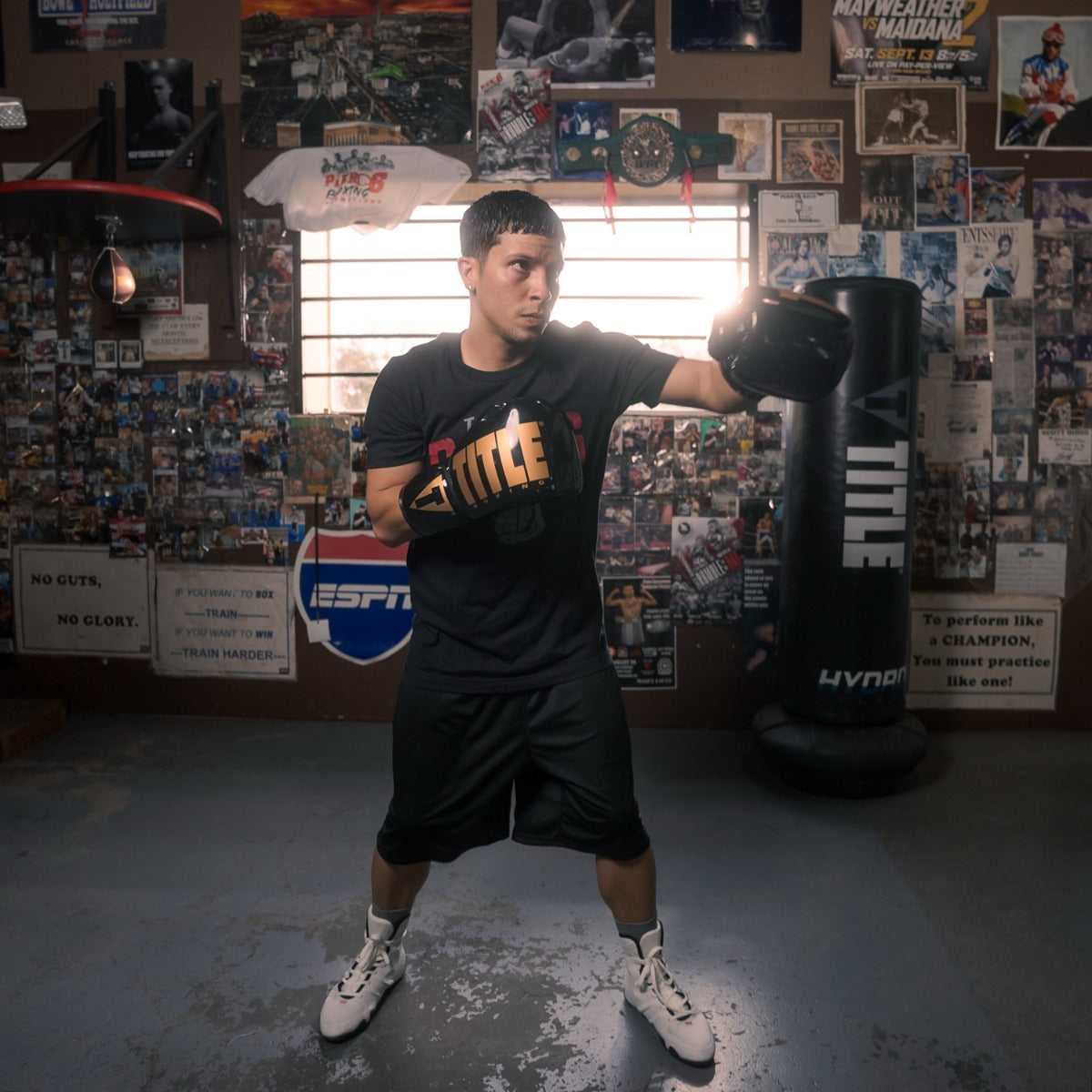 variant:Black/Gold::TITLE Boxing Inferno Intensity Lace Training Gloves left jab