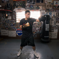 variant:Black/Gold::TITLE Boxing Inferno Intensity Lace Training Gloves left jab