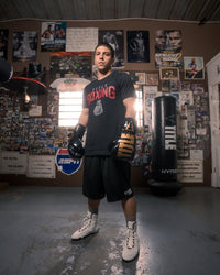 variant:Black/Gold::TITLE Boxing Inferno Instensity lace Training Gloves boxing stance