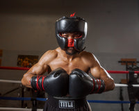 variant:Black::TITLE Boxing Ko-Vert Headgear man posing in headgear