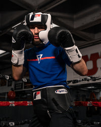 variant:Black::Fighting Pro Protective Cup man with hands up wearing cup