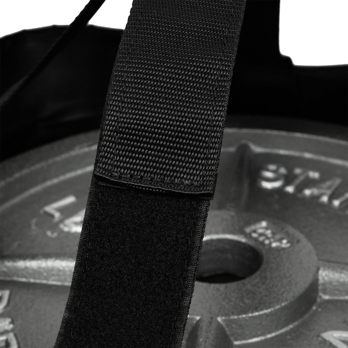 variant:lifestyle::TITLE Boxing Open-Face Bag Anchor close up view of weight in bag
