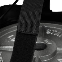 variant:lifestyle::TITLE Boxing Open-Face Bag Anchor close up view of weight in bag