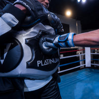 variant:lifestyle::TITLE Platinum Body Protector close up of hitting protector