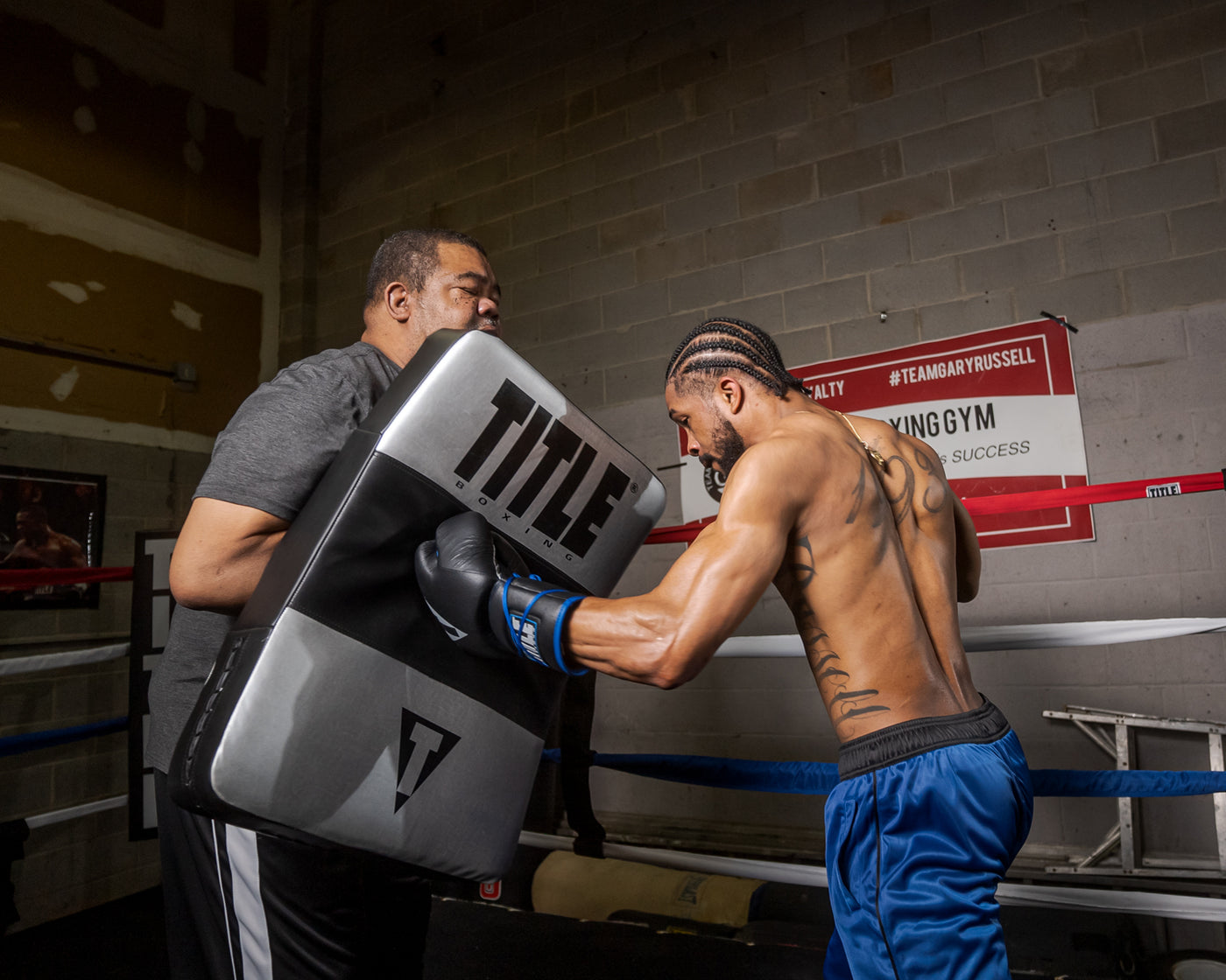 variant:lifestyle::TITLE Platinum Punch and Body Shield 2.0 boxer with coach
