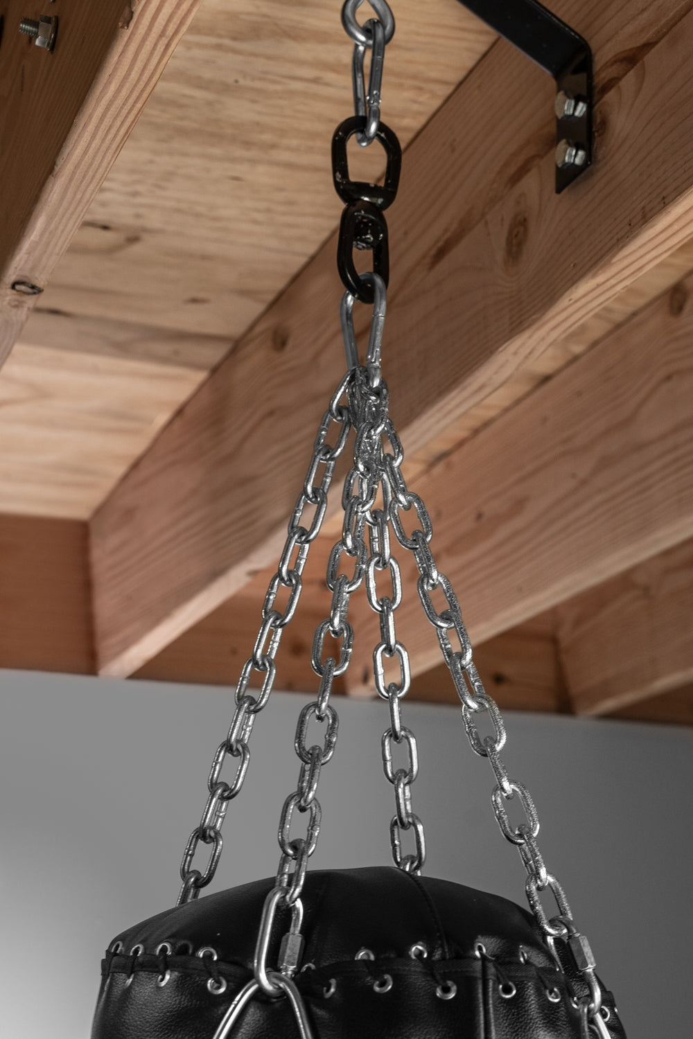 variant:lifestyle::TITLE Platinum Pro Heavy Bag Chain & Swivel (Holds up to 250 lbs.) in use with a heavy bag