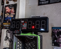 variant:lifestyle::TITLE Platinum Professional Fight & Gym Timer in a boxing gym with remote