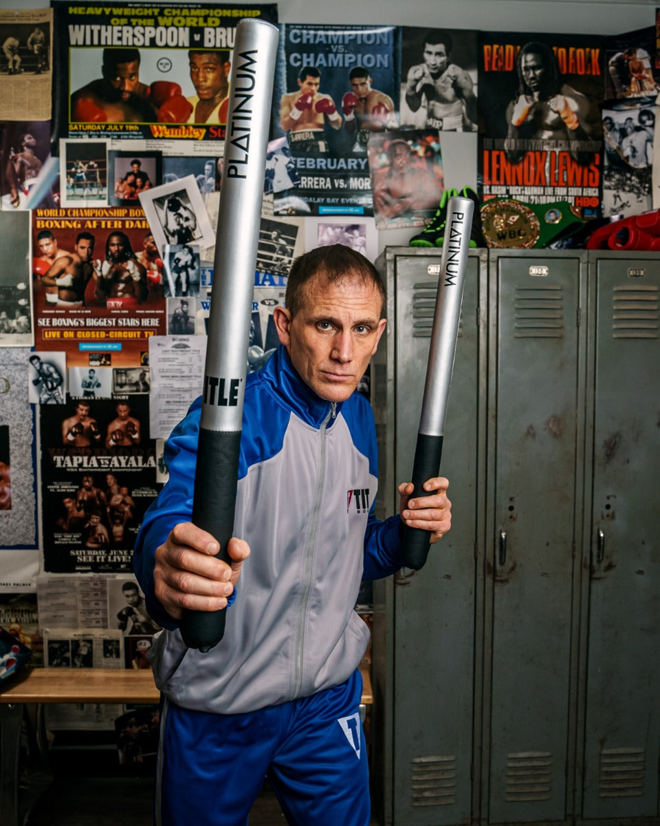 variant:lifestyle::TITLE Platinum Striking Sticks coach with sticks