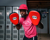 variant:lifestyle::Pro Mex Pantera Curved Punch Mitts 3.0 coach  mitts up