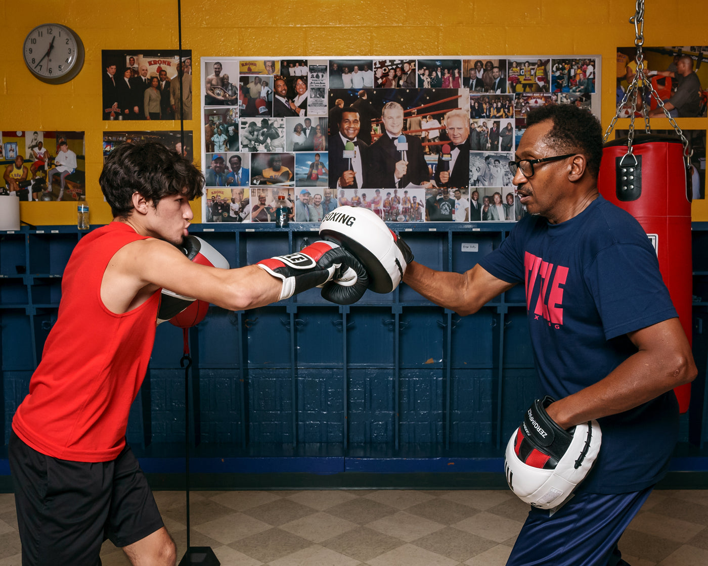 variant:lifestyle::TITLE Boxing Zero-Impact "Rare Air" Punch Mitts 2.0 mitting with coach