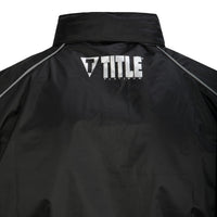 variant:lifestyle::TITLE Platinum Prevail Rubberized Sauna Suit main view hood off TITLE logo