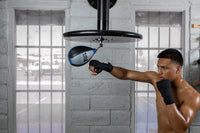 variant:lifestyle::TITLE Platinum Perilous Speed Bag guy punching speed bag