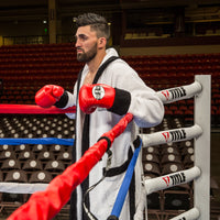 variant:lifestyle::TITLE Boxing Ring Turnbuckle Covers man in the ring 