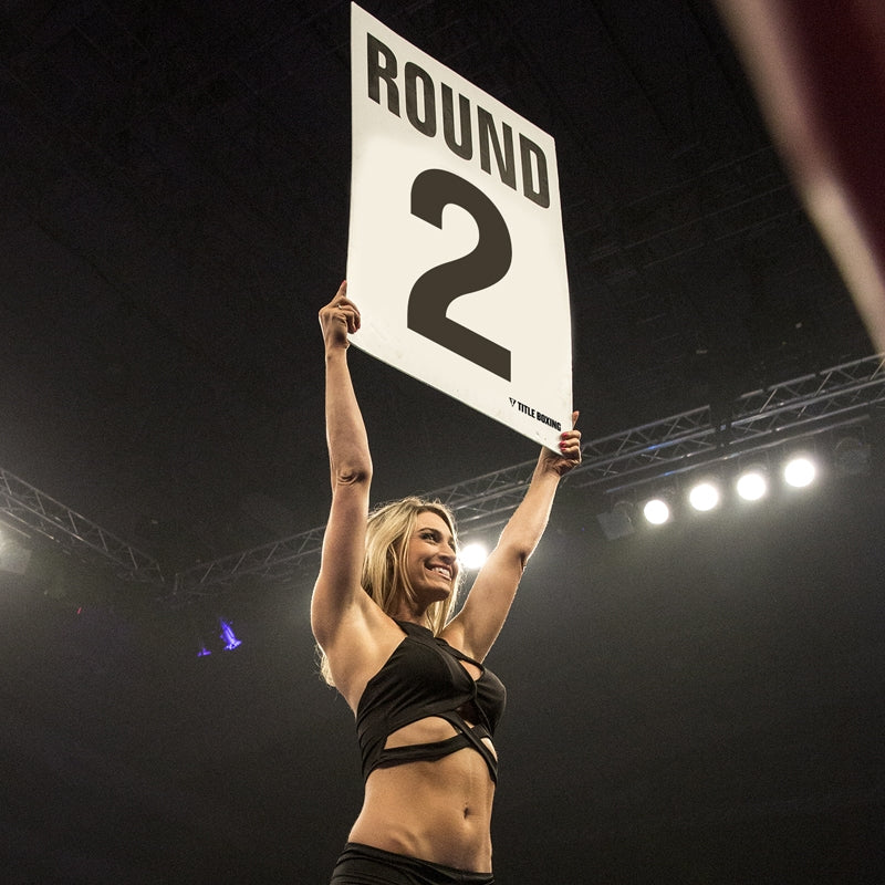variant:2::TITLE Boxing Jumbo Round Cards girl holding card up in boxing ring