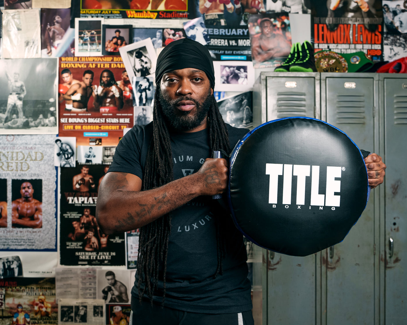 variant:lifestyle::TITLE Boxing Round Punch Shield coach holding up