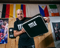 variant:Lifestyle::TITLE Boxing Square Punch and Kick Shield coach  holding facing downwards