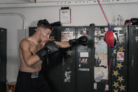 variant:lifestyle::TITLE boxing Rebounder Double End Bag guy hitting