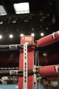 variant:lifestyle::TITLE Boxing Rope Retainer Ring in a boxing ring