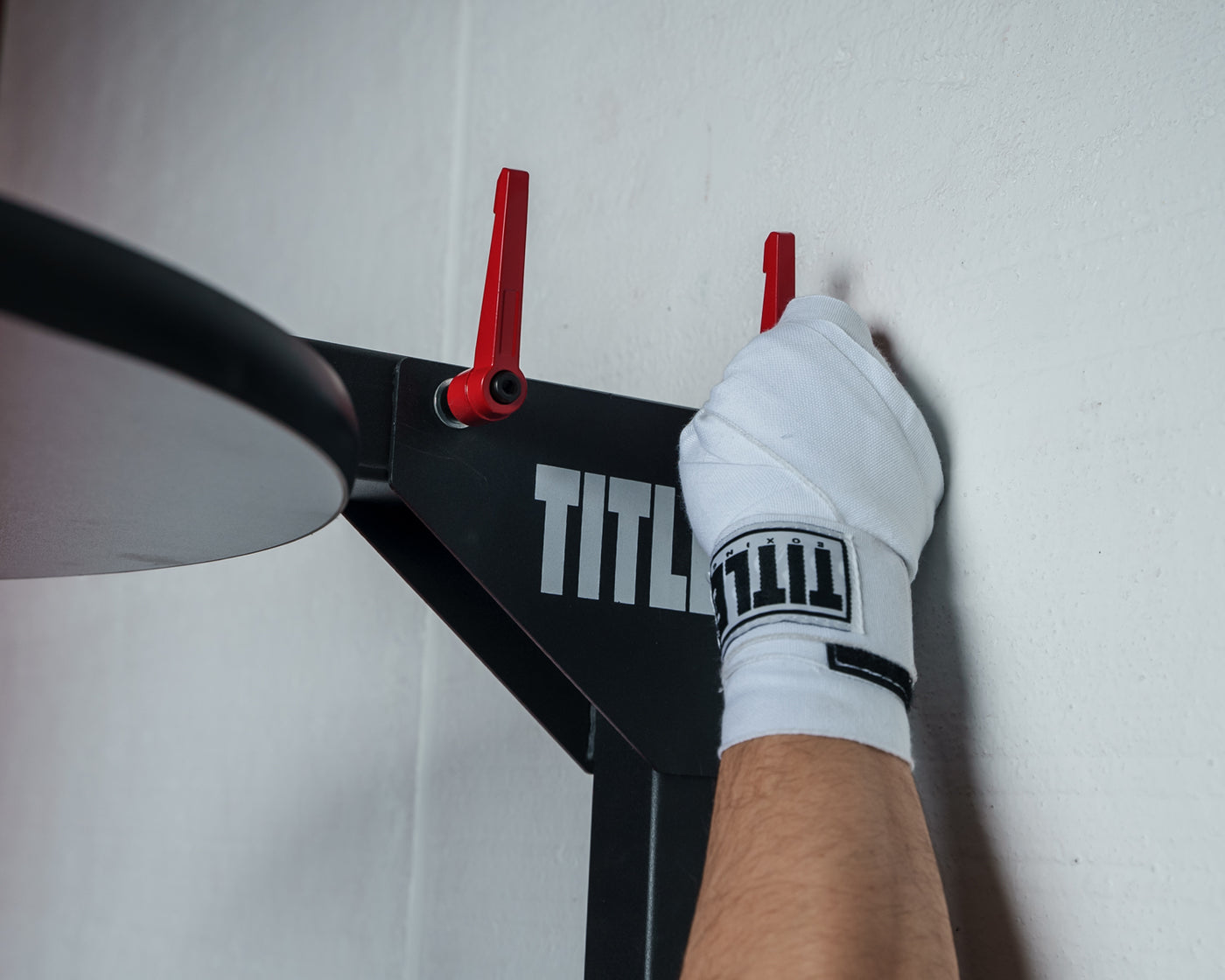 variant:lifestyle::TITLE Fold-Away Adjustable Speed Bag Platform 2.0 adjusting top of back of platform