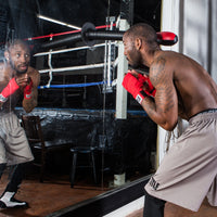 variant:lifestyle::TITLE Boxing Precision Slip Stick in use in a boxing gym