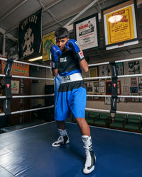 variant:blue/black::TITLE Boxing Latitude Amateur Boxing Set guy in ring