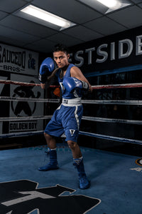 variant:Blue::TITLE Boxing Speed-Flex Encore High-Top Shoes man posing in shoes