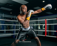 variant:black/white::TITLE Boxing Edge Boxing Trunks 2.0 guy left jab in ring