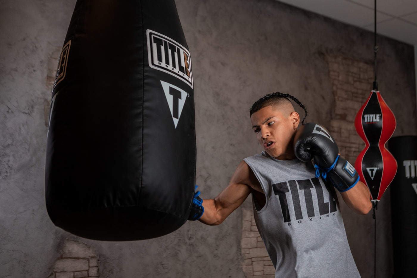 variant:Lifestyle::TITLE Boxing Tear Drop Heavy Bag kid hitting
