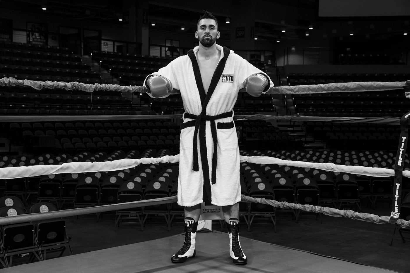 variant:Black/White::TITLE Boxing Speed-Flex Encore High-Top Shoes man standing in ring