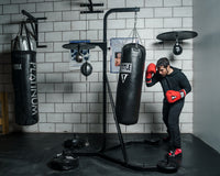 variant:lifestyle::TITLE Boxing Heavy Bag And Speed Bag Stand full view in a boxing gym