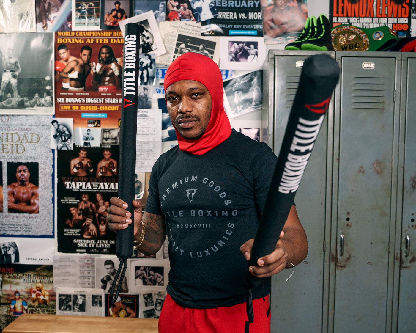 variant:lifestyle::TITLE Boxing Precision Training Sticks 2.0 coach sticks up