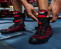 variant:lifestyle::TITLE Boxing Fast Feet Trainer close up of ankle straps