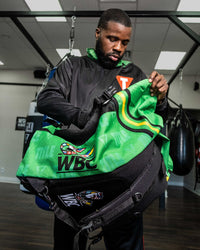 variant:lifestyle::WBC by TITLE Boxing Sport Bag/Backpack guy wearing bag
