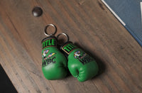 variant:lifestyle::WBC by TITLE Boxing Keyring on desk 