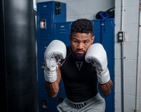 variant:lifestyle::TITLE White Boxing Lace Sparring Gloves 2.0 man wearing gloves posing