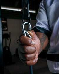 variant:lifestyle::TITLE Boxing Carabiner Double End Bag Cord in use with a bag