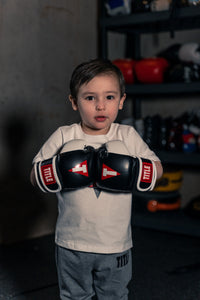 variant:Black/White::TITLE Boxing Youth Bag Gloves youth wearing gloves