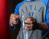 variant:lifestyle::TITLE Boxing Portable Zip Hand Wrap Roller how to insert the hand wrap loop