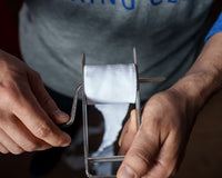 variant:lifestyle::TITLE Boxing Portable Zip Hand Wrap Roller in use